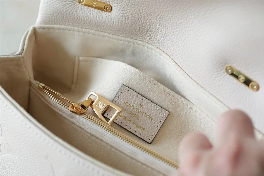 Louis Vuitton Madeleine BB Monogram Empreinte Creme Beige - Image 4