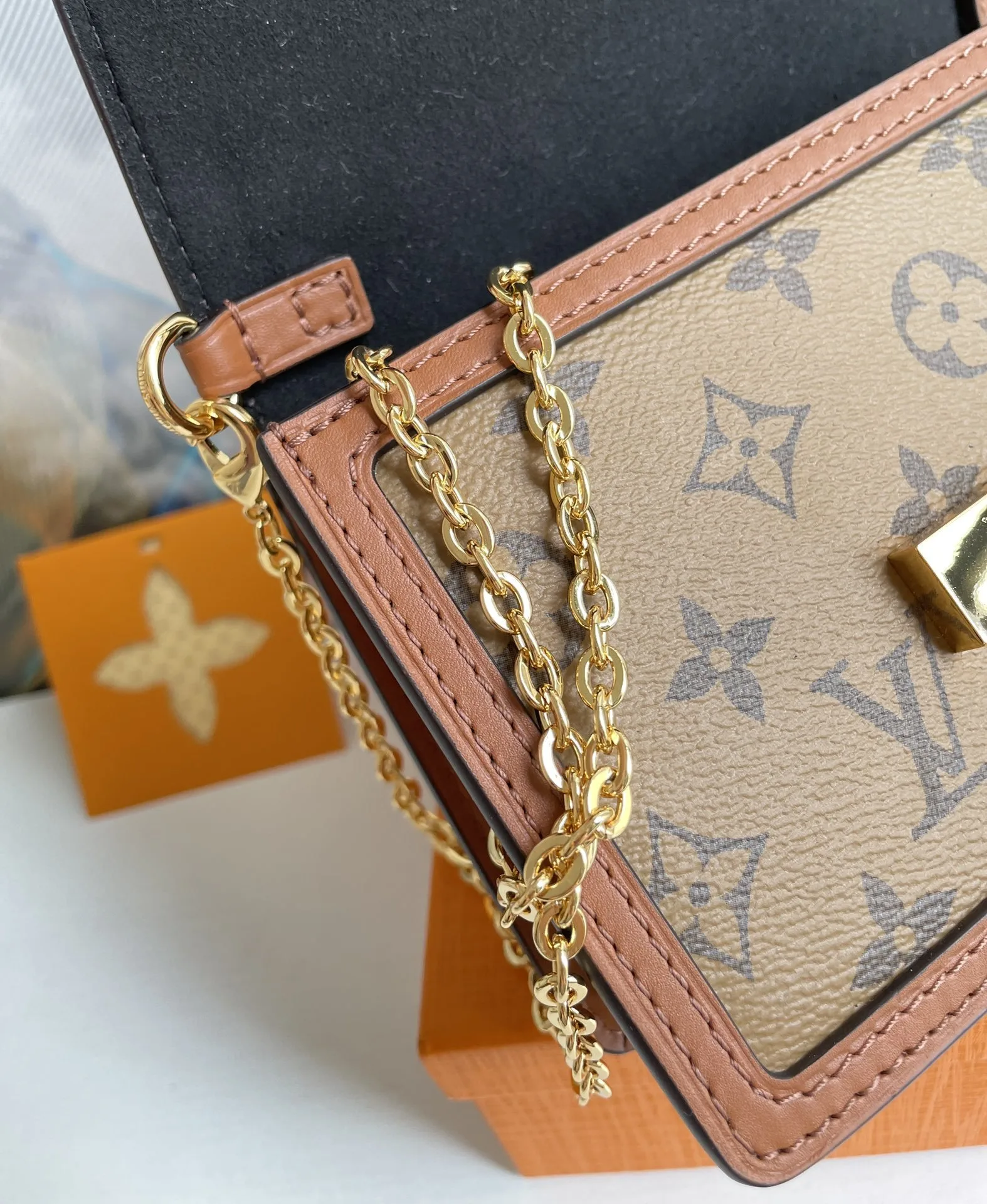 Louis Vuitton Dauphine Chain Wallet Combines Monogram And Monogram Reverse Canvas By Nicolas Ghesquière - Image 2