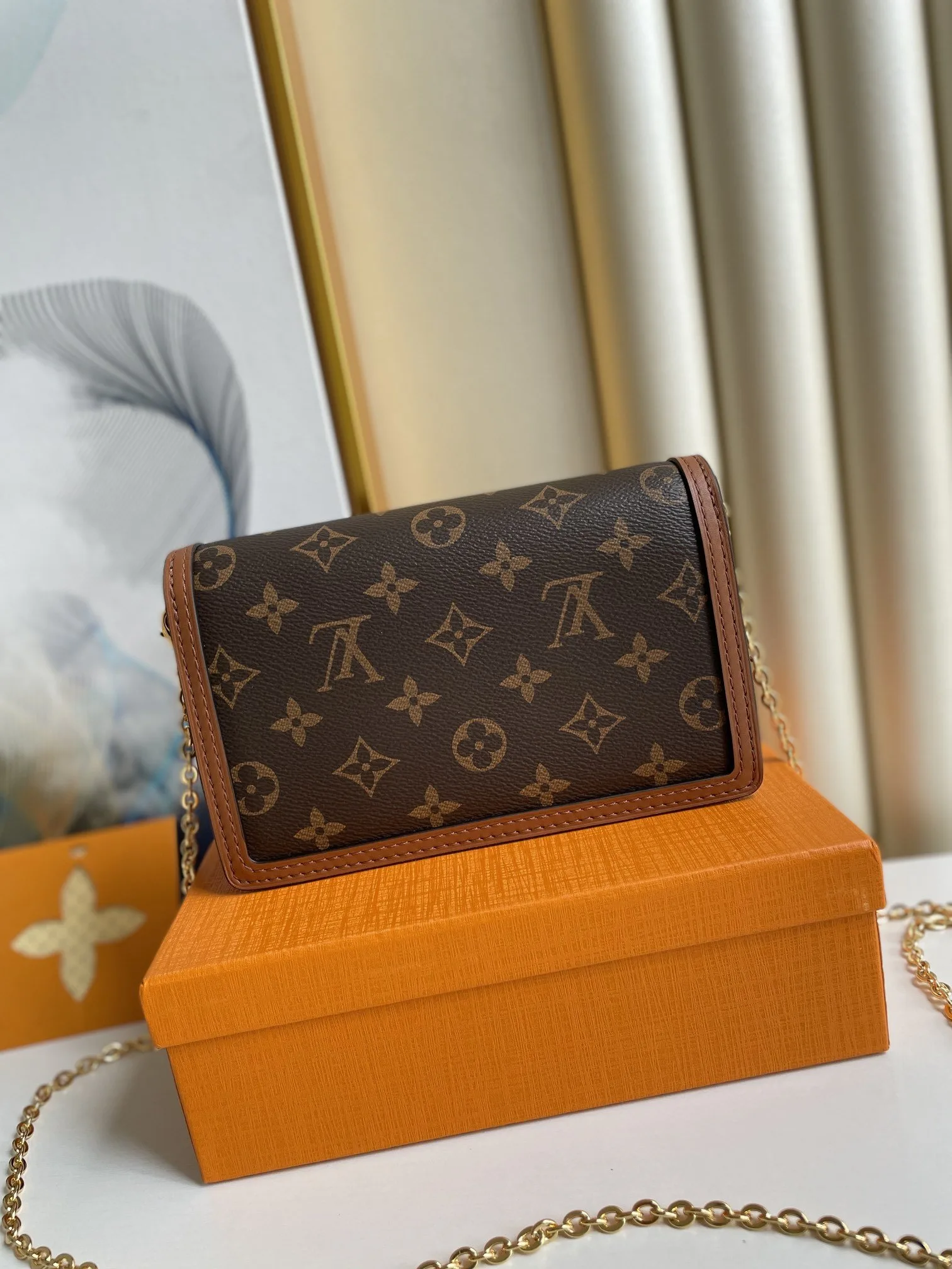 Louis Vuitton Dauphine Chain Wallet Combines Monogram And Monogram Reverse Canvas By Nicolas Ghesquière - Image 8