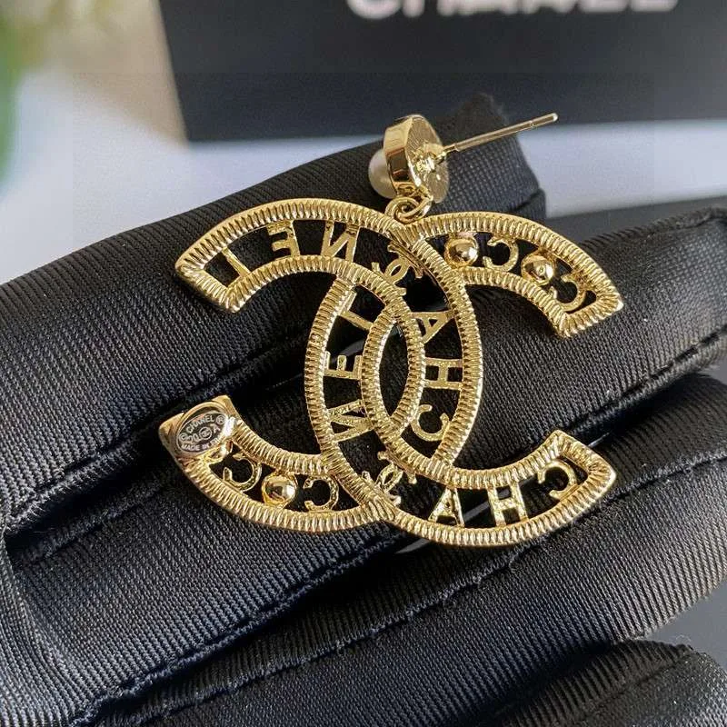 Alternative view of Chanel CC Letter Earrings Gold