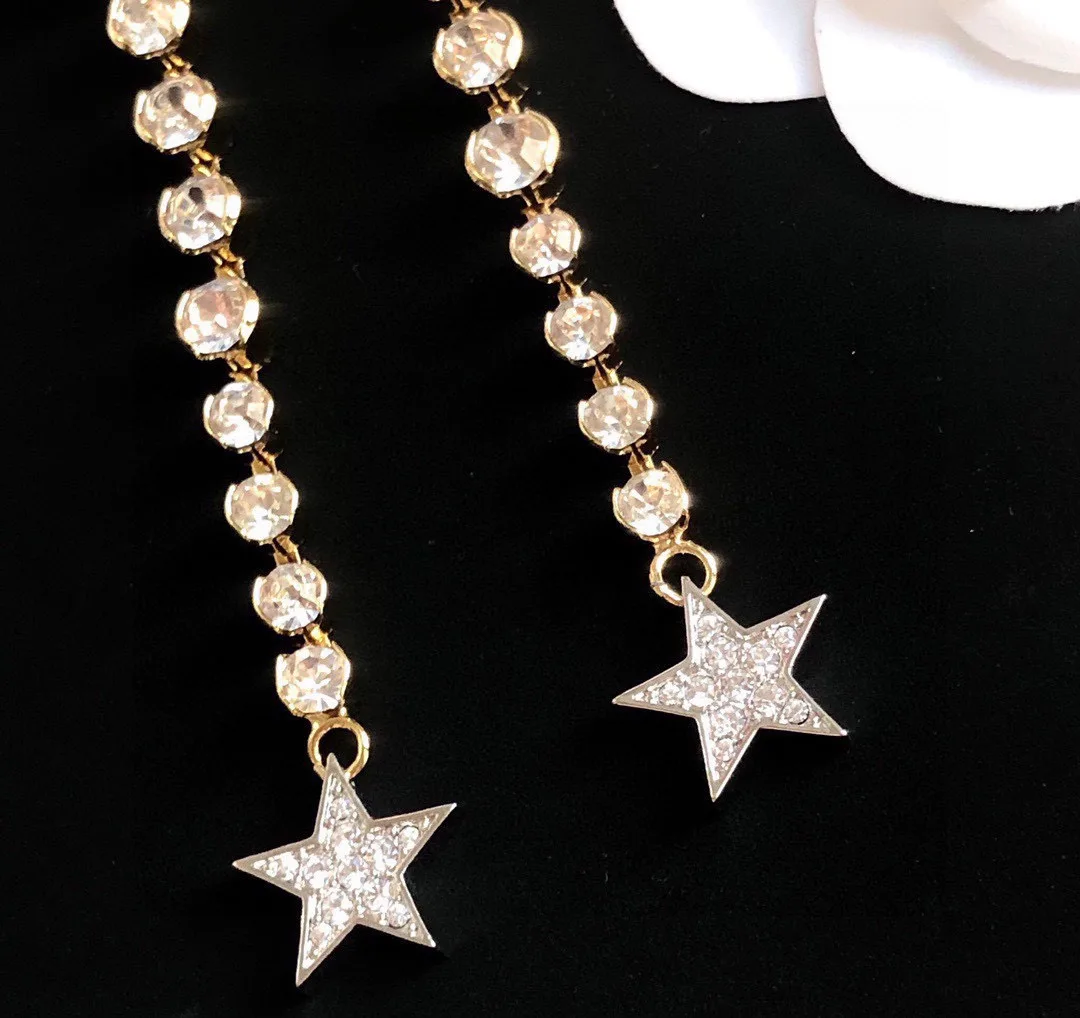 Chanel Long Star Earrings Gold - Image 3