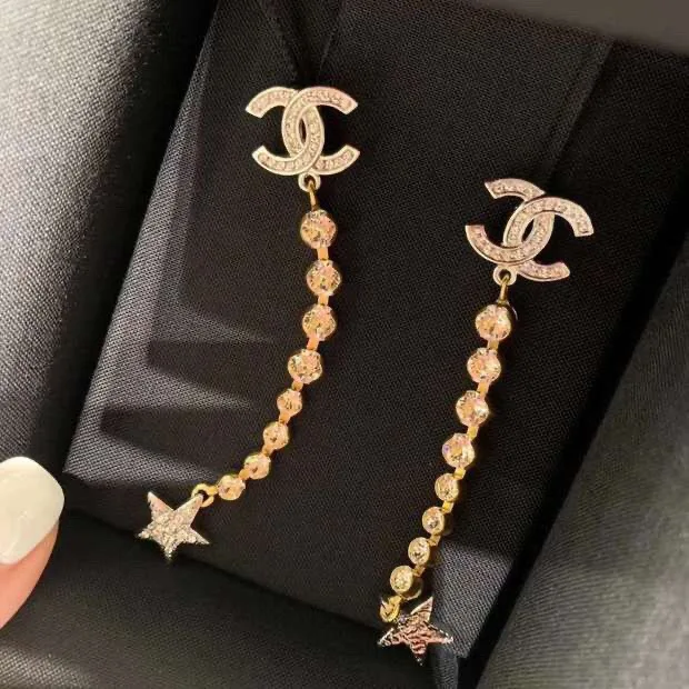 Chanel Long Star Earrings Gold - Image 9