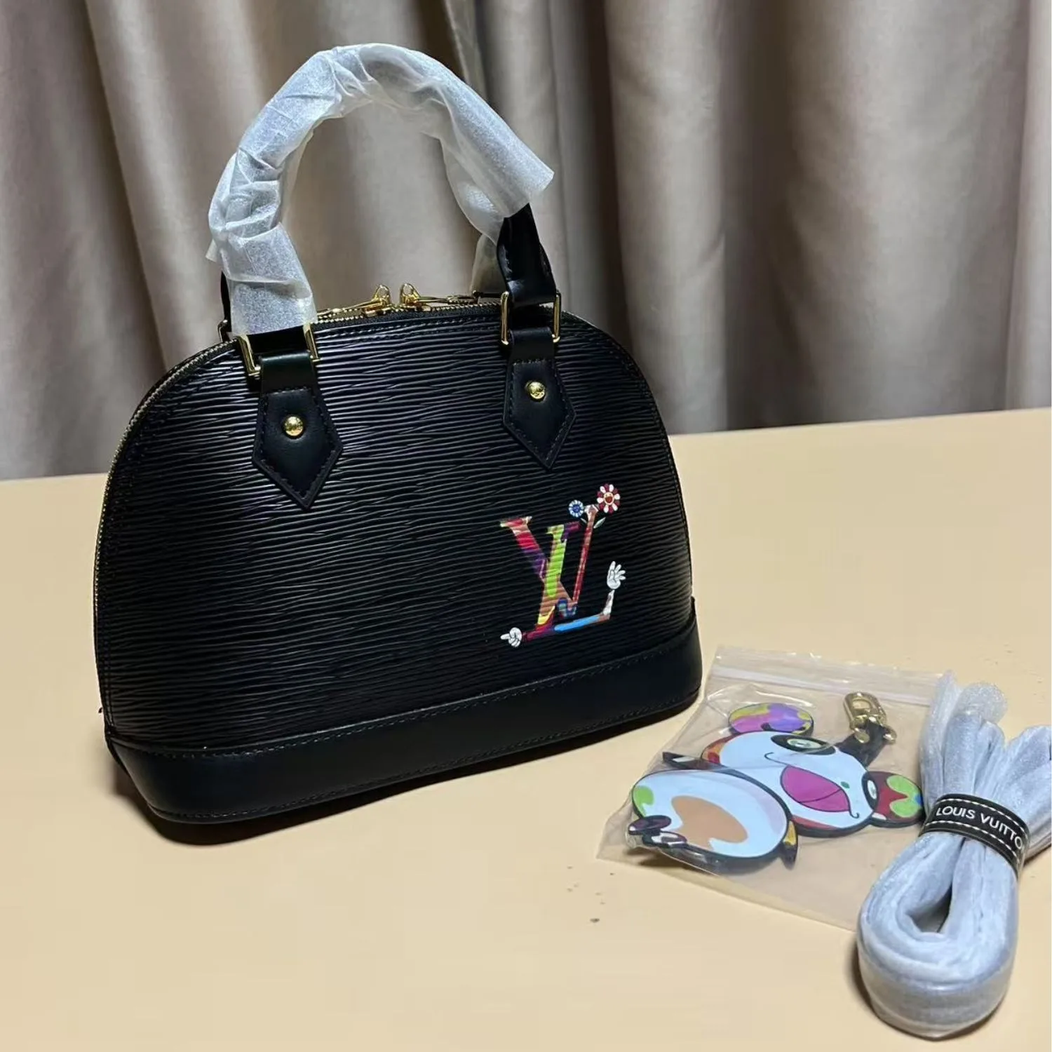 Alternative view of Louis Vuitton LV x TM Alma BB Top Handle Bag / Black Gold Hardware