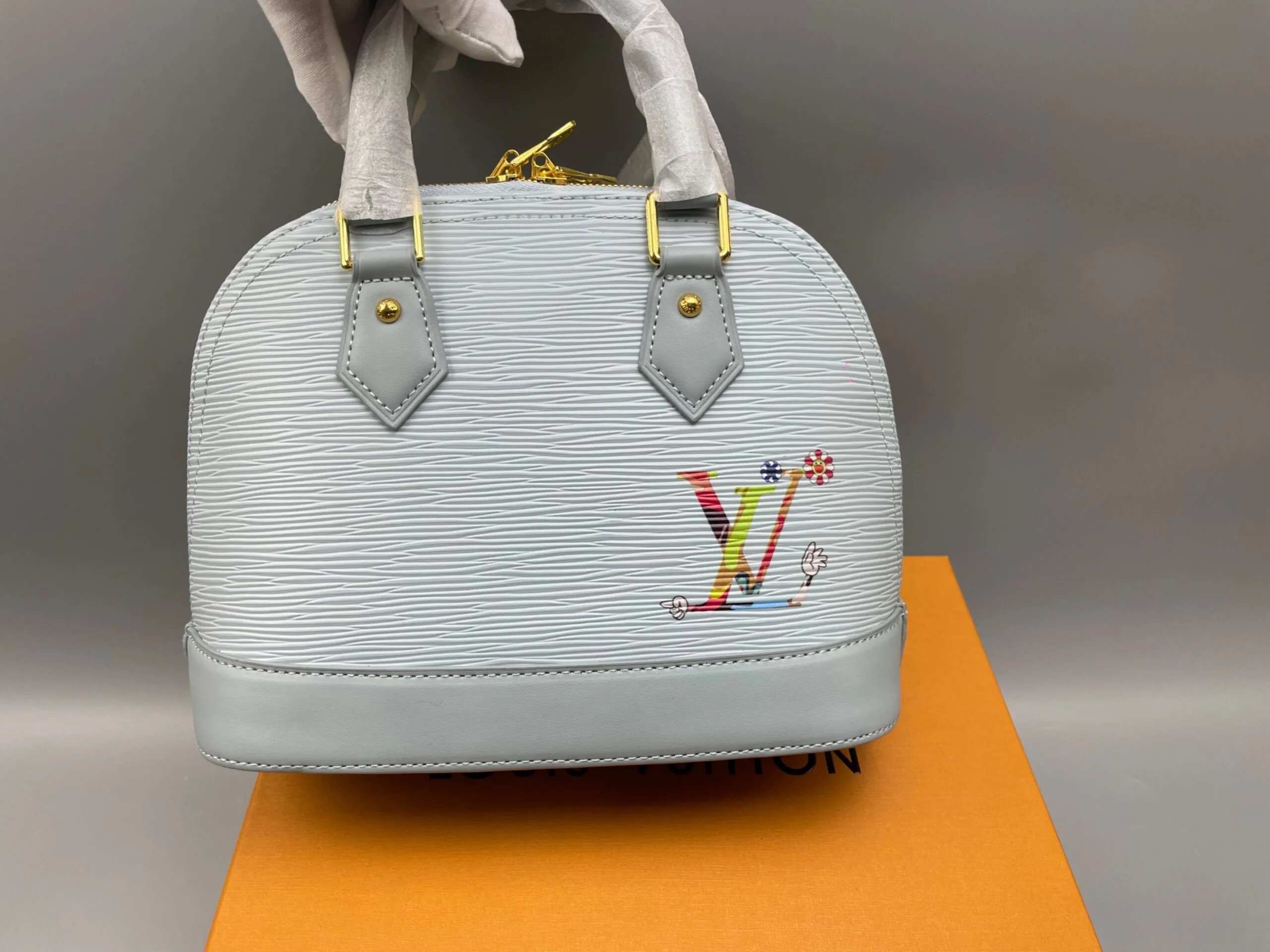 Alternative view of Louis Vuitton LV x TM Alma BB Top Handle Bag / Washed Blue Gold Hardware