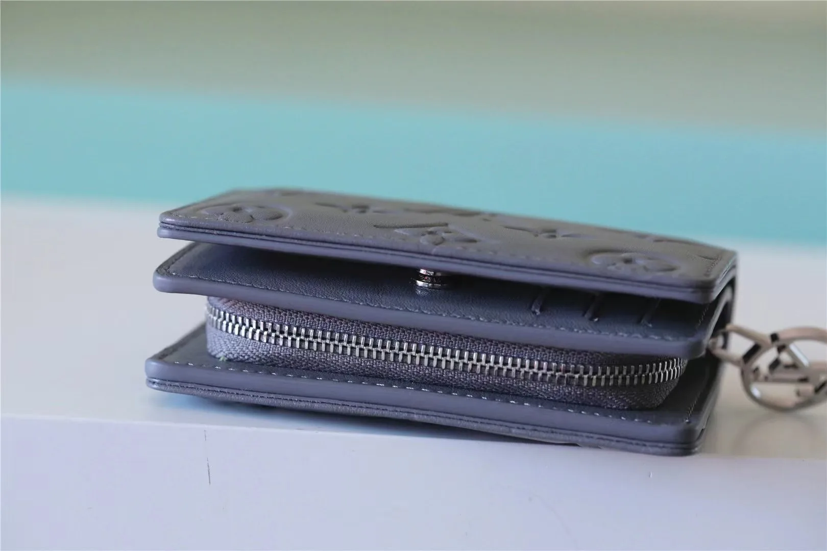 Louis Vuitton Lou Wallet / Monogram Embossed Grey Silver Hardware - Image 4