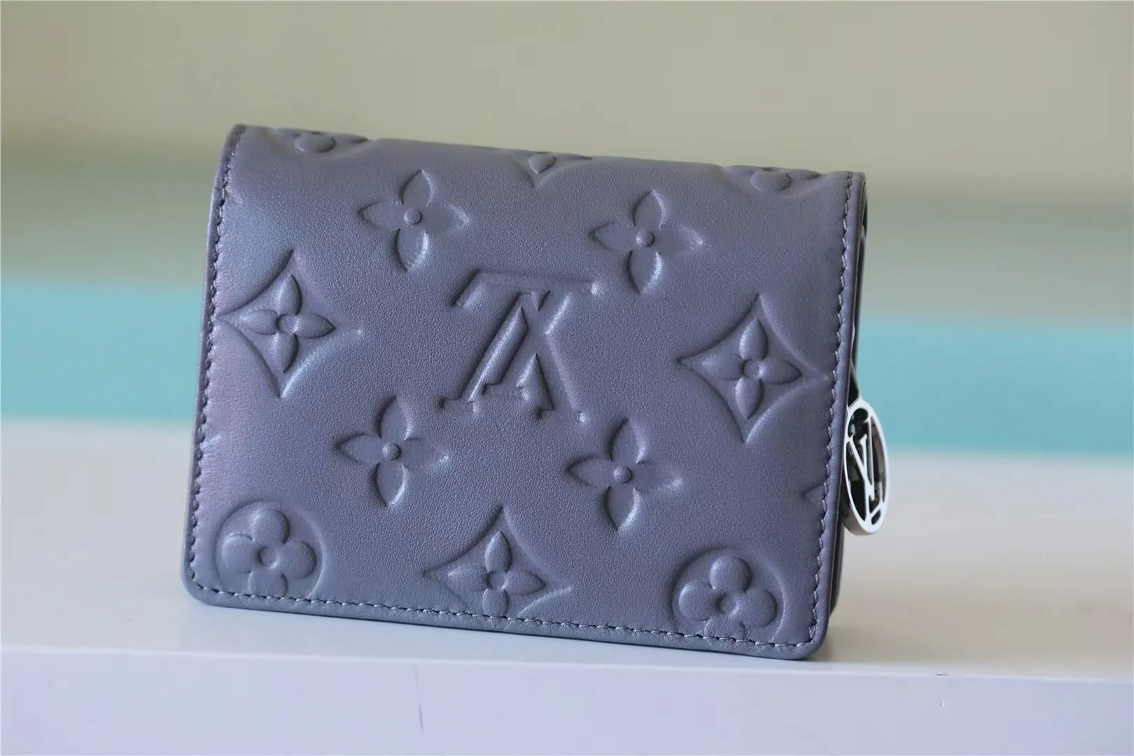 Louis Vuitton Lou Wallet / Monogram Embossed Grey Silver Hardware - Image 3