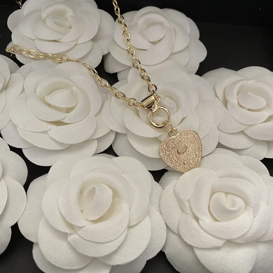 Chanel Twinkle Heart Chain Necklace Gold Tone - Image 6