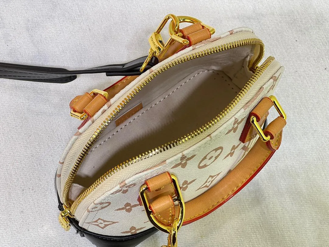 Alternative view of Louis Vuitton Nano Alma Top Handle Bag / White/ Brown Gold Hardware