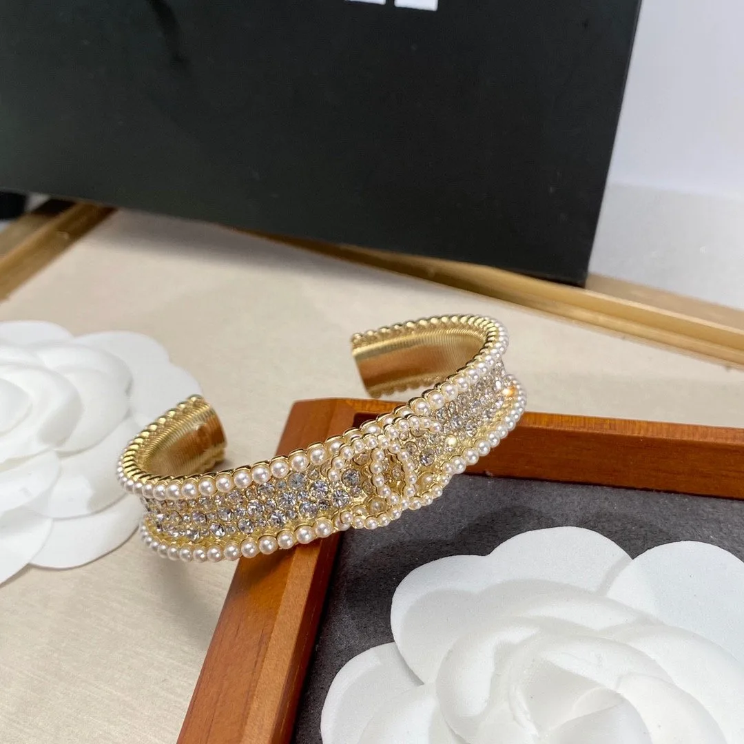Chanel Pearl And Crystal Interlocking CC Cuff Bracelet Gold Hardware - Image 7
