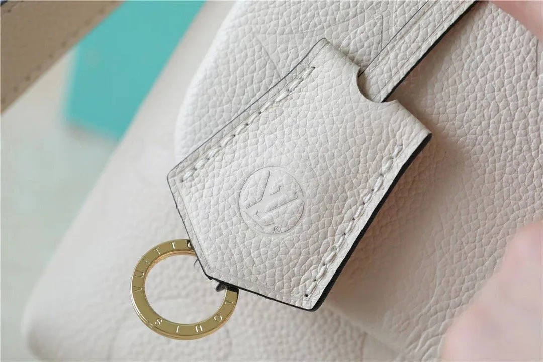 Alternative view of Louis Vuitton Madeleine BB Monogram Empreinte Creme Beige