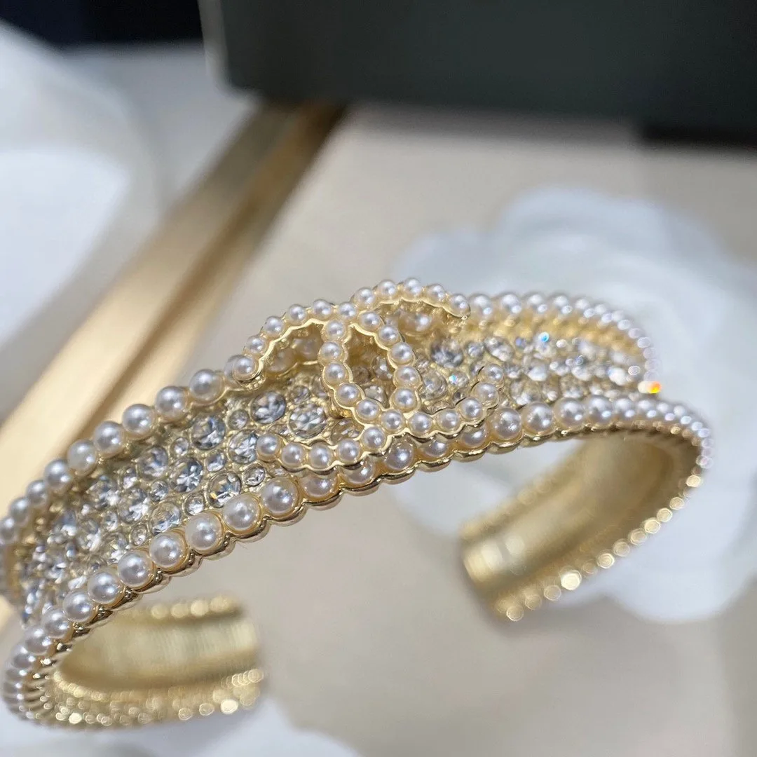 Chanel Pearl And Crystal Interlocking CC Cuff Bracelet Gold Hardware - Image 6