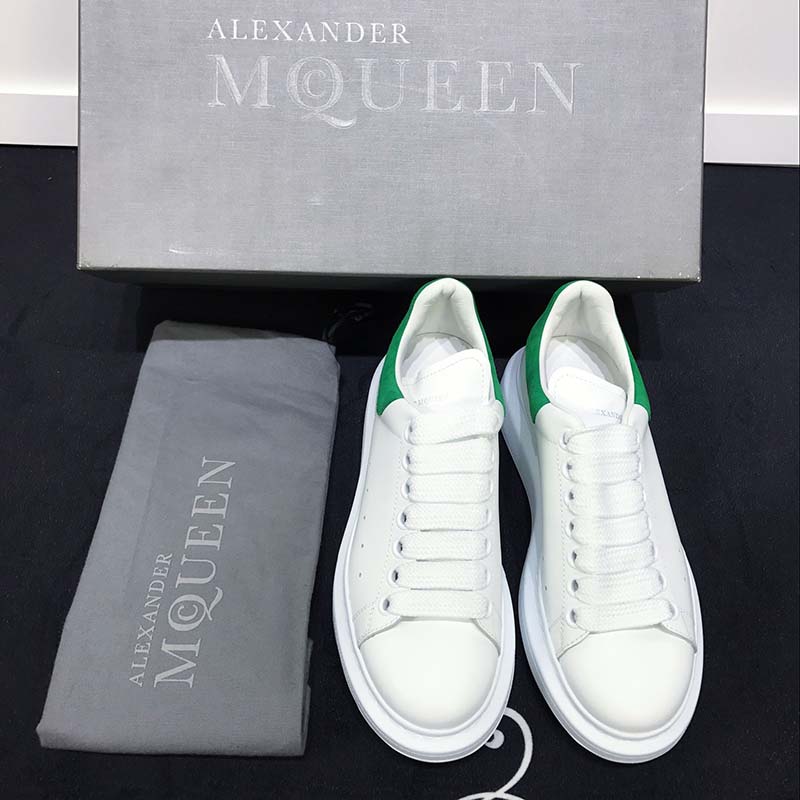 Top view showing lacing and chunky sole on Alexander McQueen Women Oversized Sneaker Shoes-Green