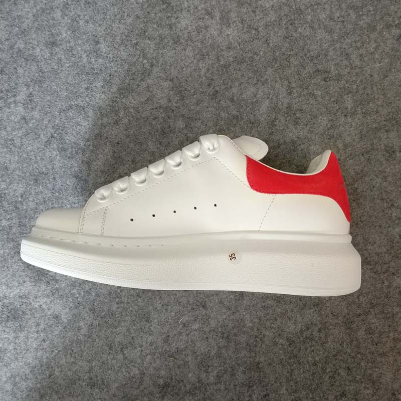 Top angle showing lace-up closure on Alexander McQueen Women Oversized Sneaker Shoes-Red