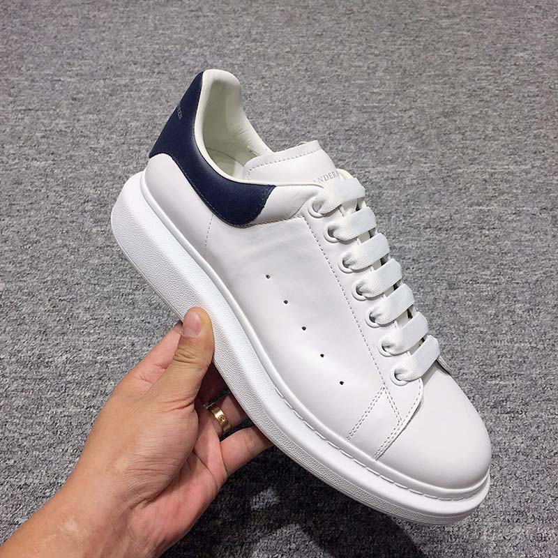 Rear angle showing navy blue heel tab on Alexander Mcqueen Oversized Sneakers