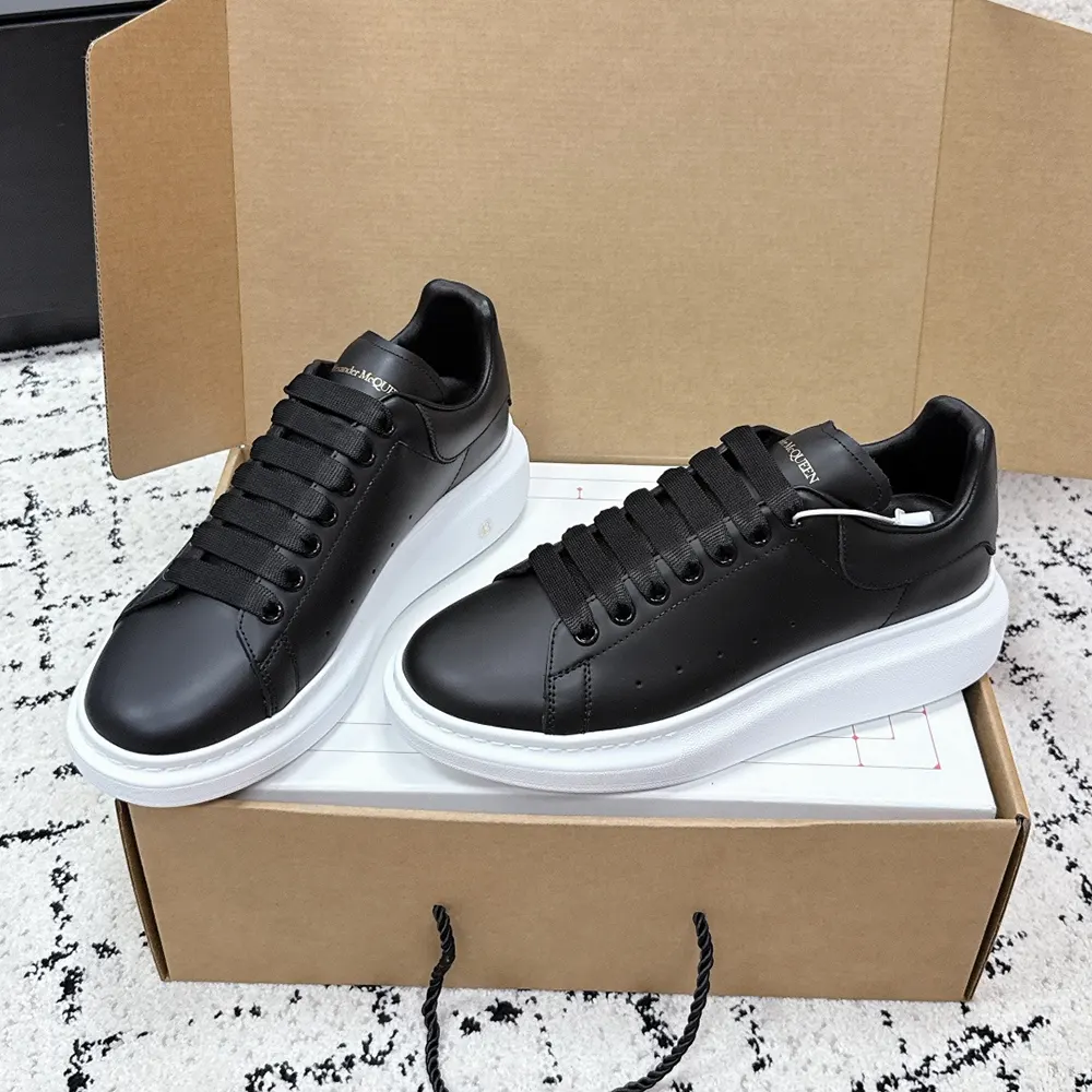 Rear view showing branded heel tab on Alexander Mcqueen Unisex Oversized Sneaker