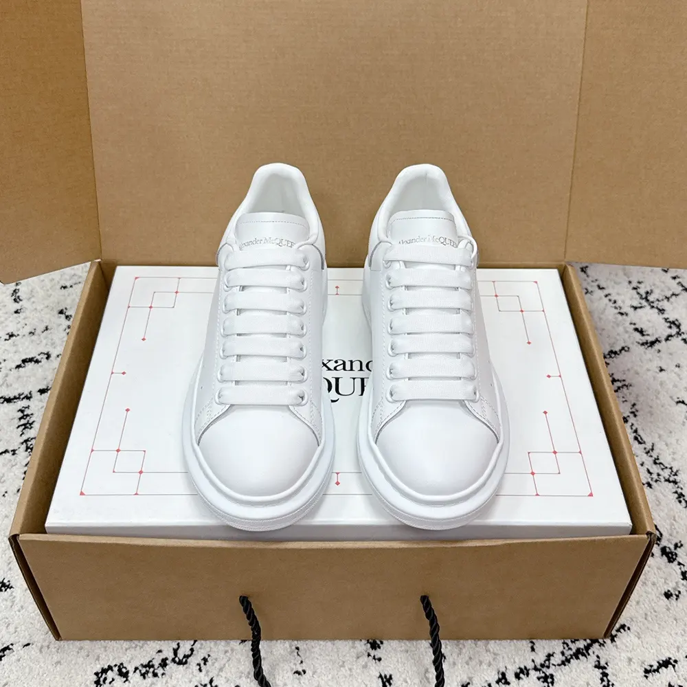 Close-up of chunky sole and leather detail on Alexander Mcqueen sneakers