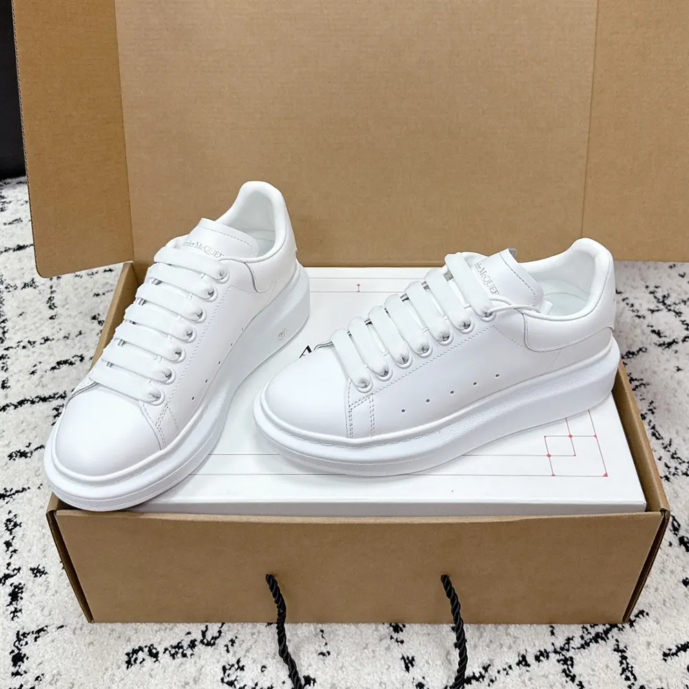 Top view showing lace-up closure on Alexander Mcqueen Unisex Oversized Sneakers