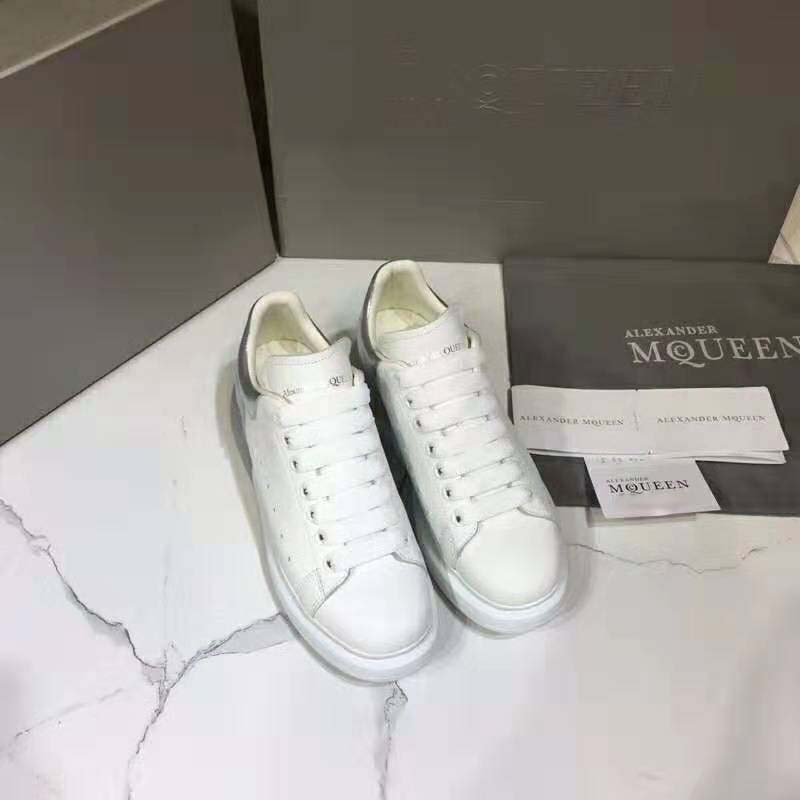 Close-up of lace-up detail on Alexander Mcqueen White Smooth Calf Leather Sneaker