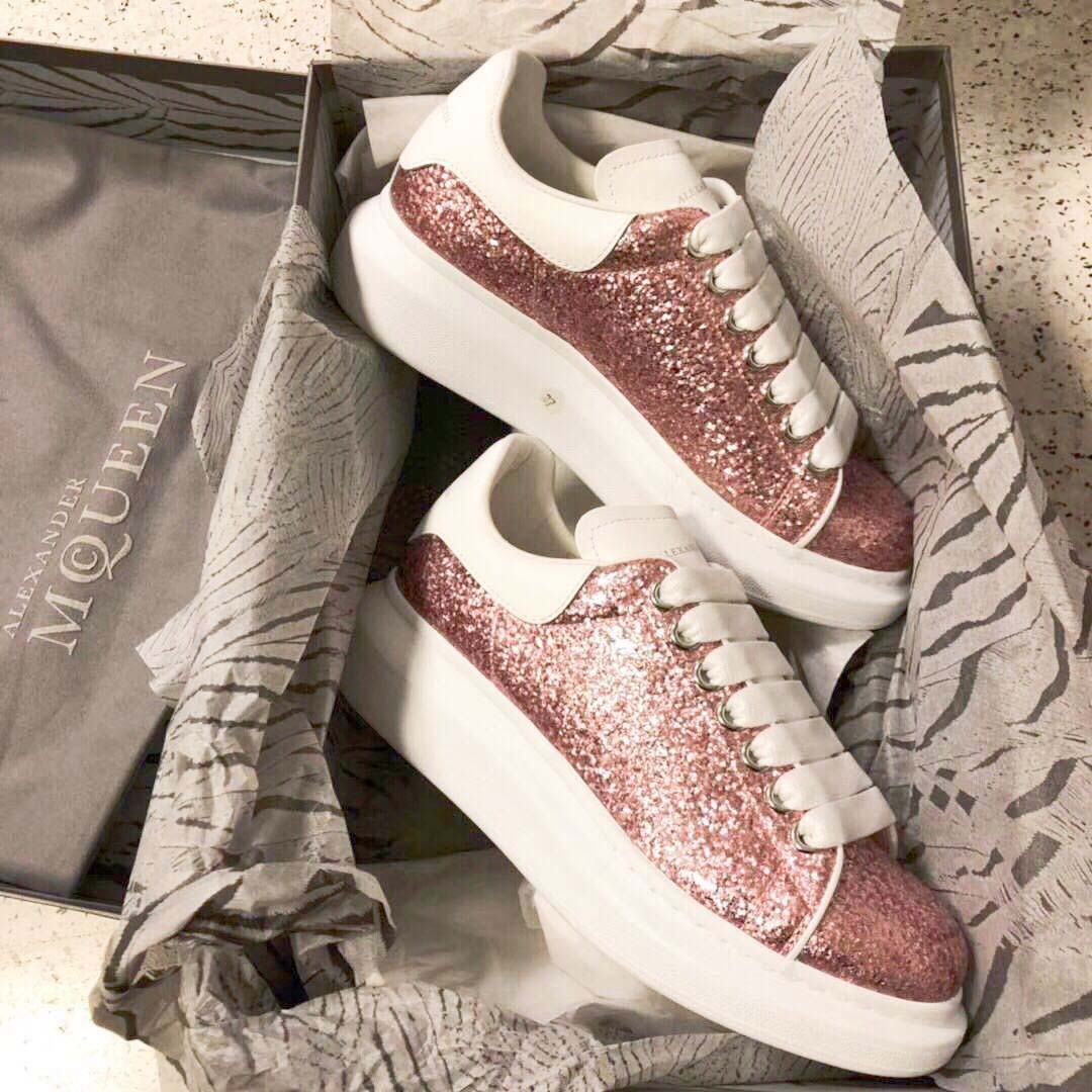 Close-up on glitter lace-up detail of Alexander Mcqueen Women Oversized Sneaker