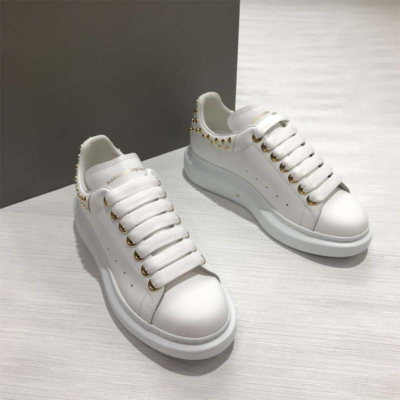 Close-up detail of white calf leather and oversized sole on Alexander Mcqueen sneaker