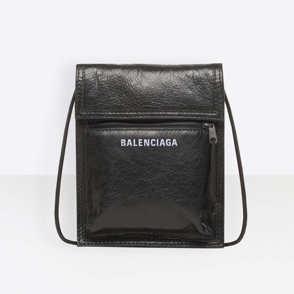 Front view of Balenciaga Men Explorer Pouch Strap in Leather-Black