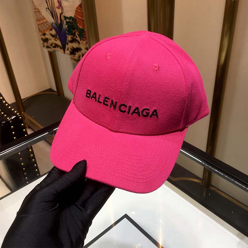 Close-up on pink cotton twill and Balenciaga logo embroidery detail