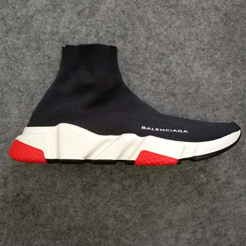 Close-up of tricolor rubber sole detail on Balenciaga Speed Trainers