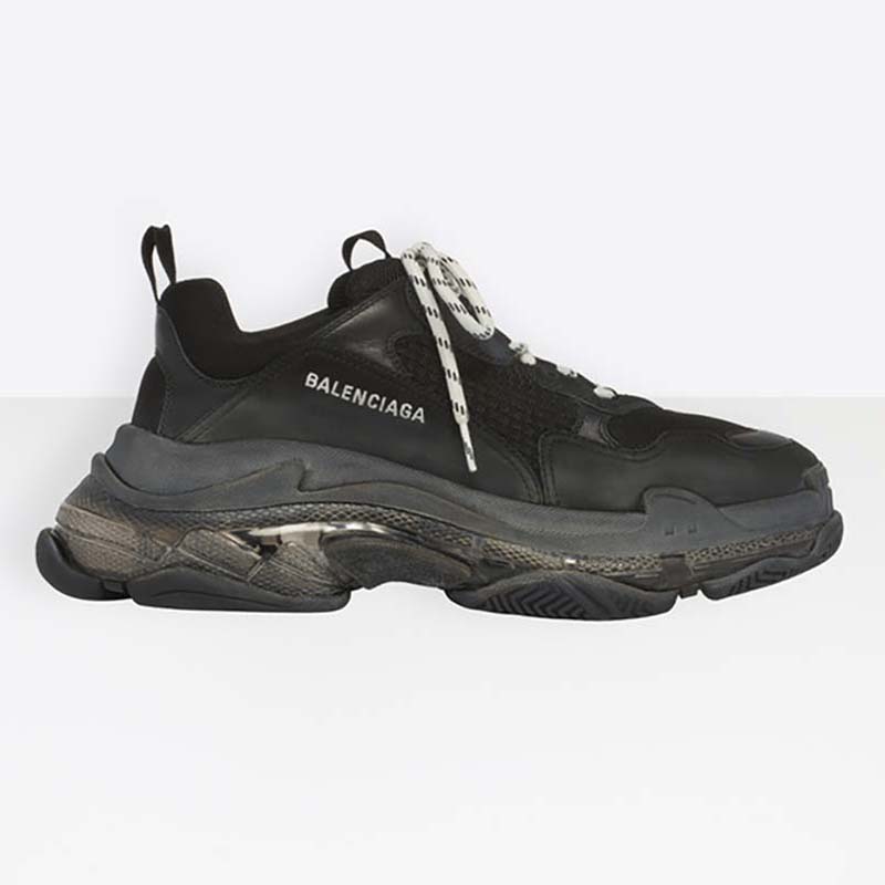 Side view of Balenciaga Unisex Shoes Triple S Clear Sole Trainers-Black showing layered sole