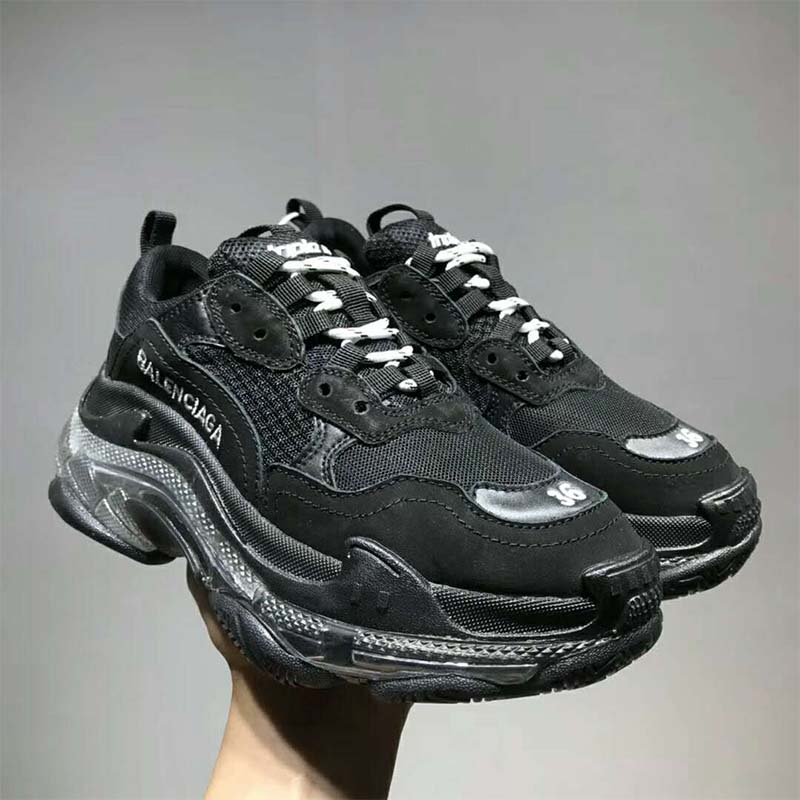 Top-down angle highlighting leather and mesh upper on Balenciaga Triple S Trainers