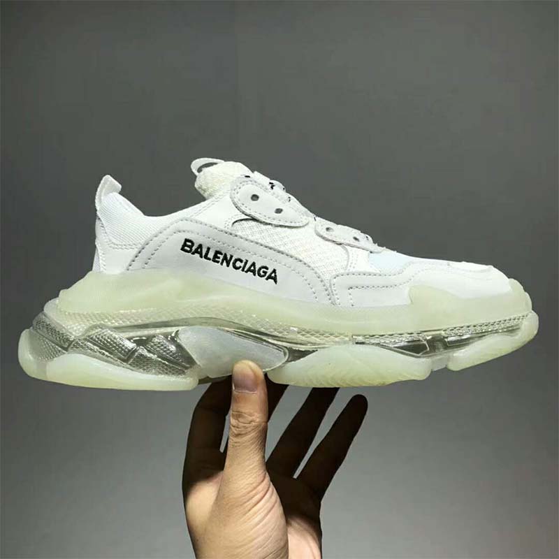 Close-up of clear translucent sole on Balenciaga Triple S trainers