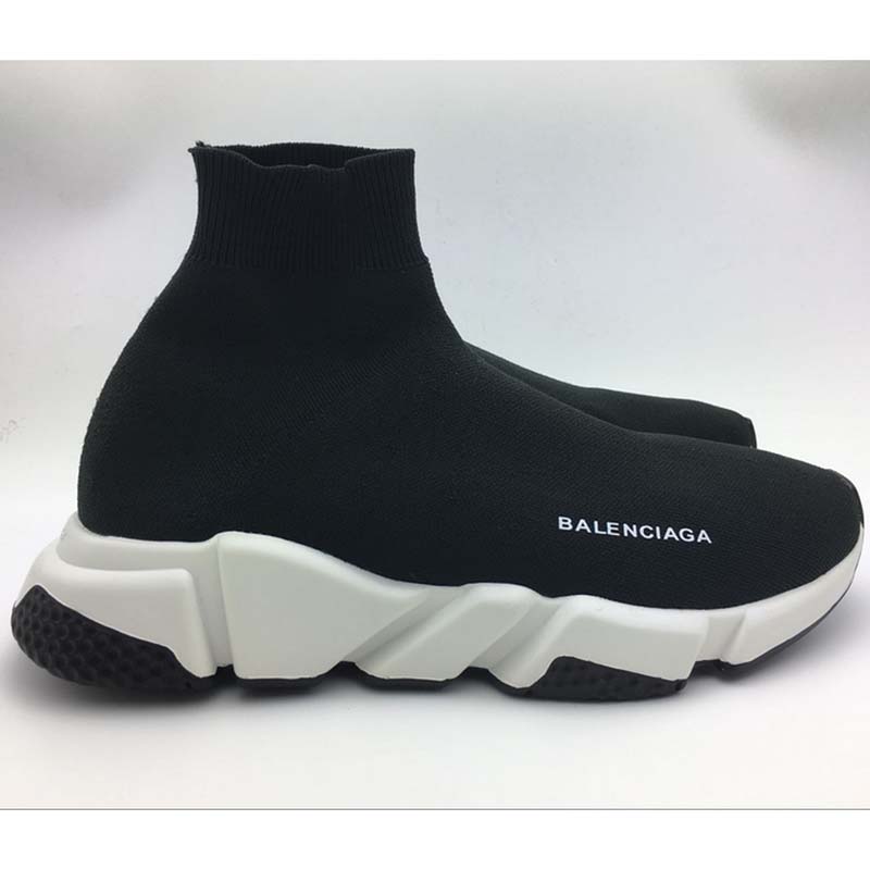 Close-up of black stretch mesh and Balenciaga logo detail