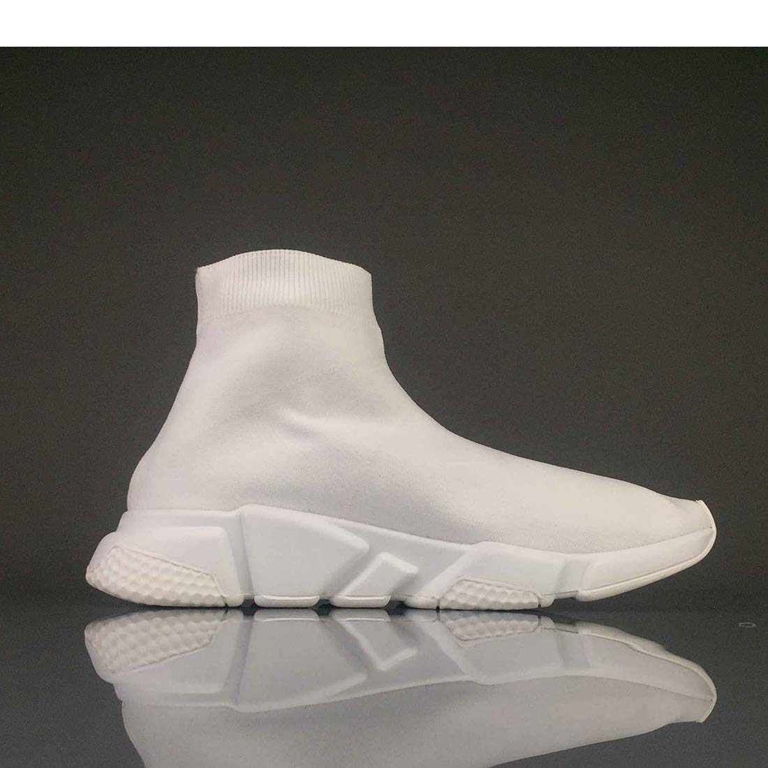 Close-up of white stretch mesh and tonal laces on Balenciaga sneakers