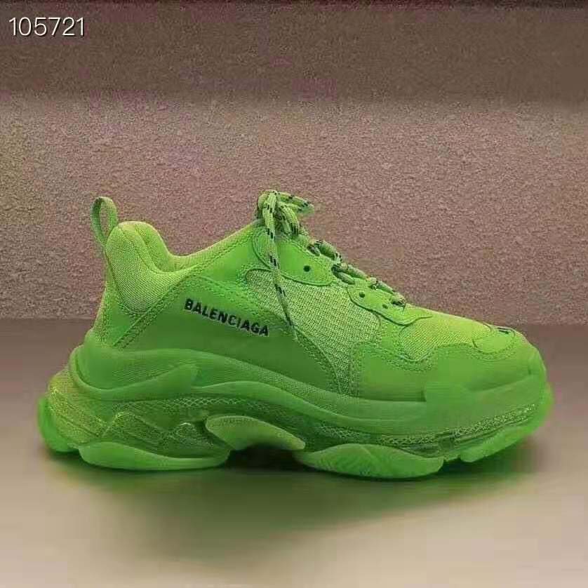 Close-up on transparent sole and lime leather overlays of Balenciaga sneakers