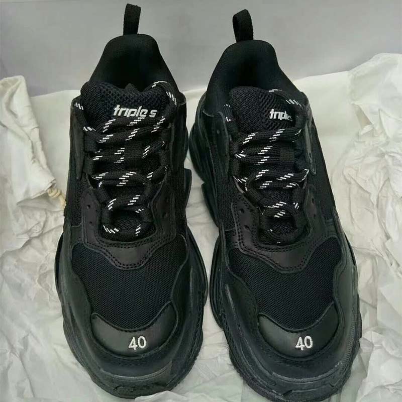 Top view showing layered sole and laces on Balenciaga Triple S Trainers