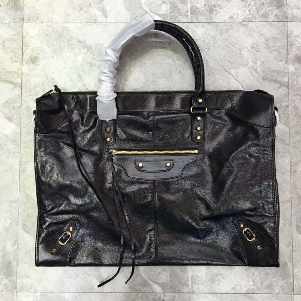 Side angle showing silhouette of Balenciaga Women Classic City Medium Lambskin Shoulder Bag