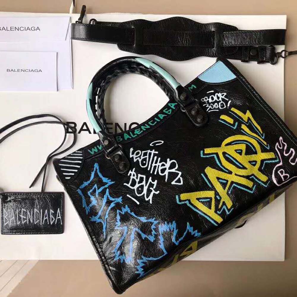 Side view showing silhouette and zip closure of Balenciaga Classic City bag