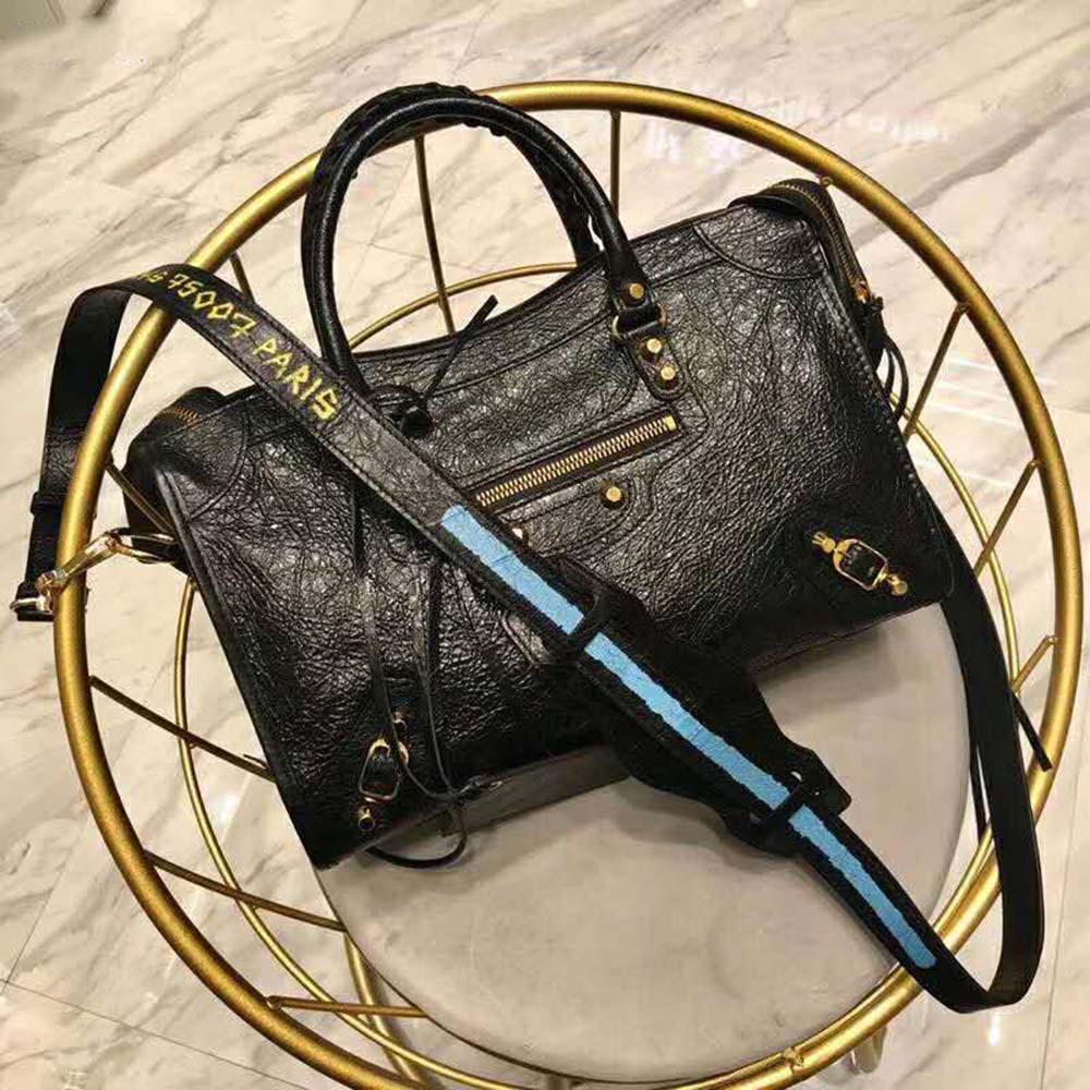 Side angle showing silhouette and leather texture of Balenciaga Classic Gold City S-Black