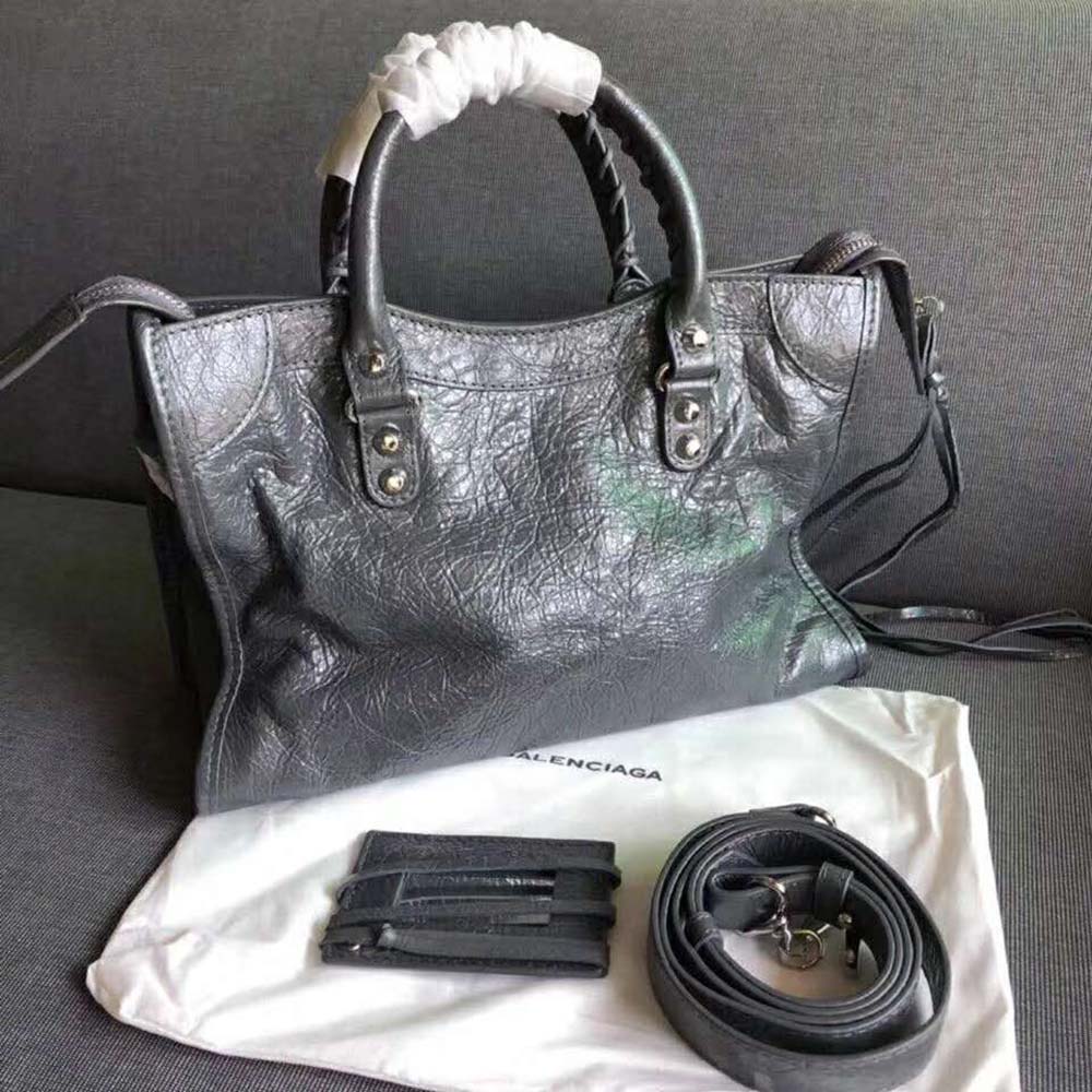 Side angle showing silhouette of Balenciaga Women Classic Gold City Small Size Lambskin Bag-Grey