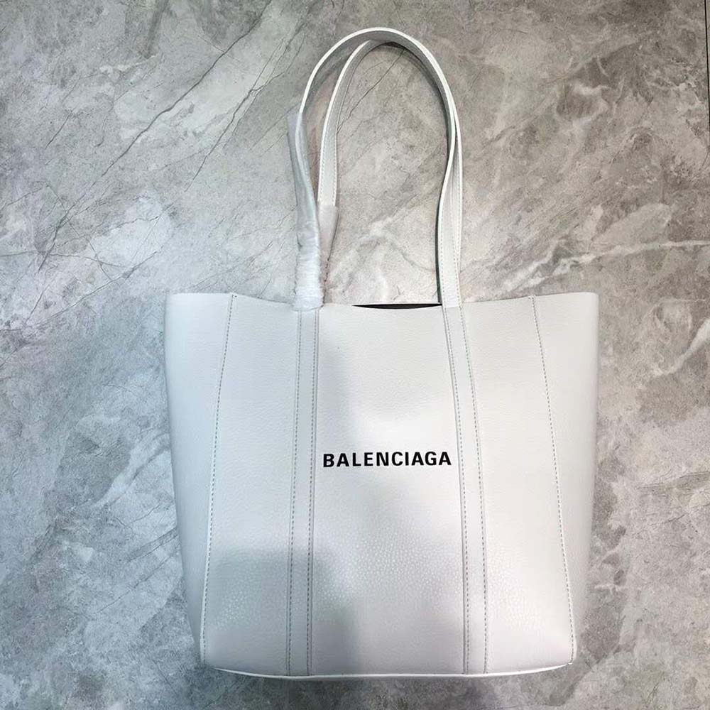 Close-up detail of silver hardware on Balenciaga white calfskin tote