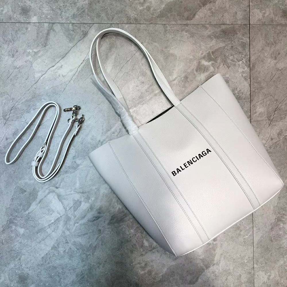Side angle showing thin handles on Balenciaga Women Everyday Tote XXS