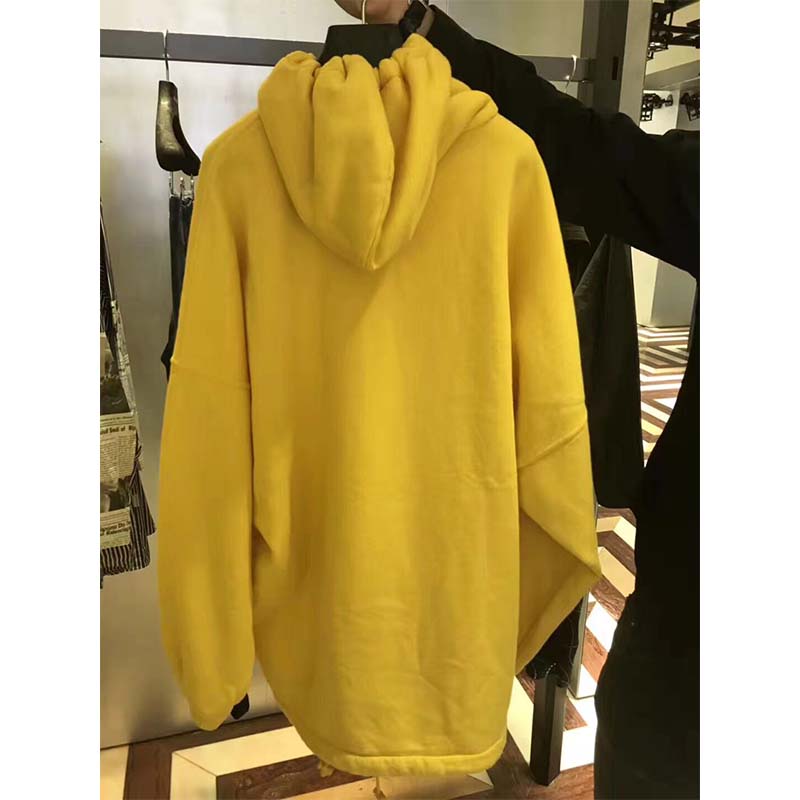 Side angle showing relaxed fit of Balenciaga Women Hoodie Cardigan Yellow