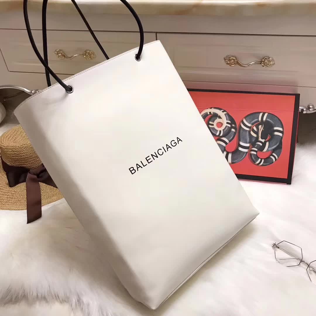 Side profile showing silhouette of Balenciaga Women North-South Calfskin Bag