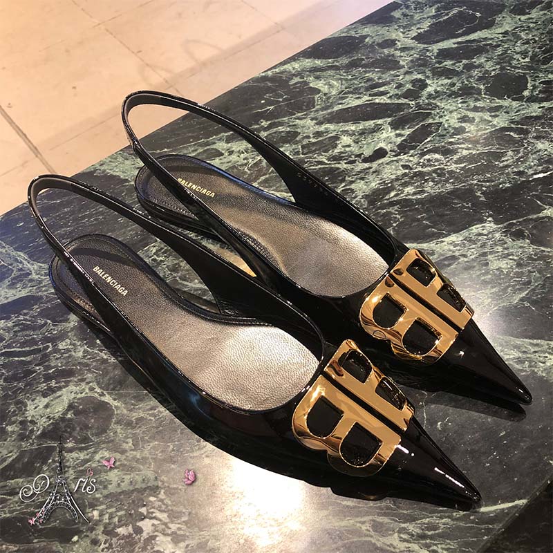 Close-up of patent leather and BB hardware on Balenciaga slingback