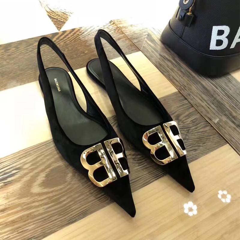 Close-up of black velvet and BB logo on Balenciaga slingback heel