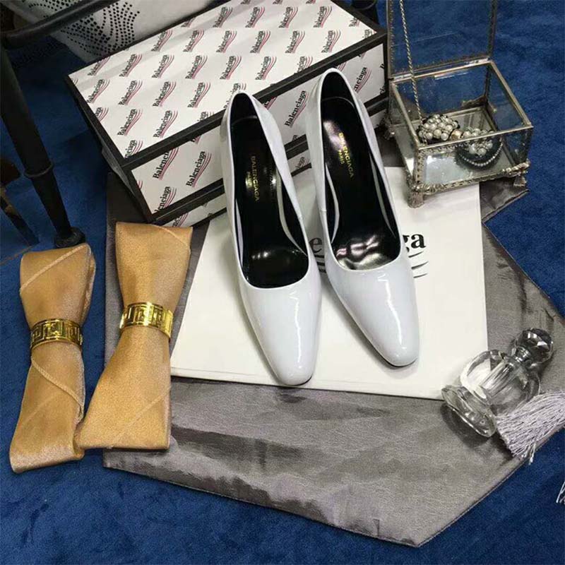 Rear angle highlighting the 110mm heel of Balenciaga Round Toe White Pumps