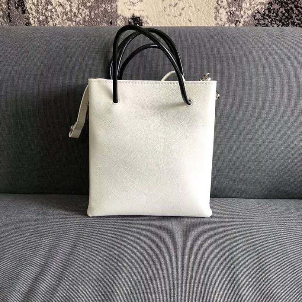 Side profile showing compact silhouette of Balenciaga Women Shopping Tote XXS Bag