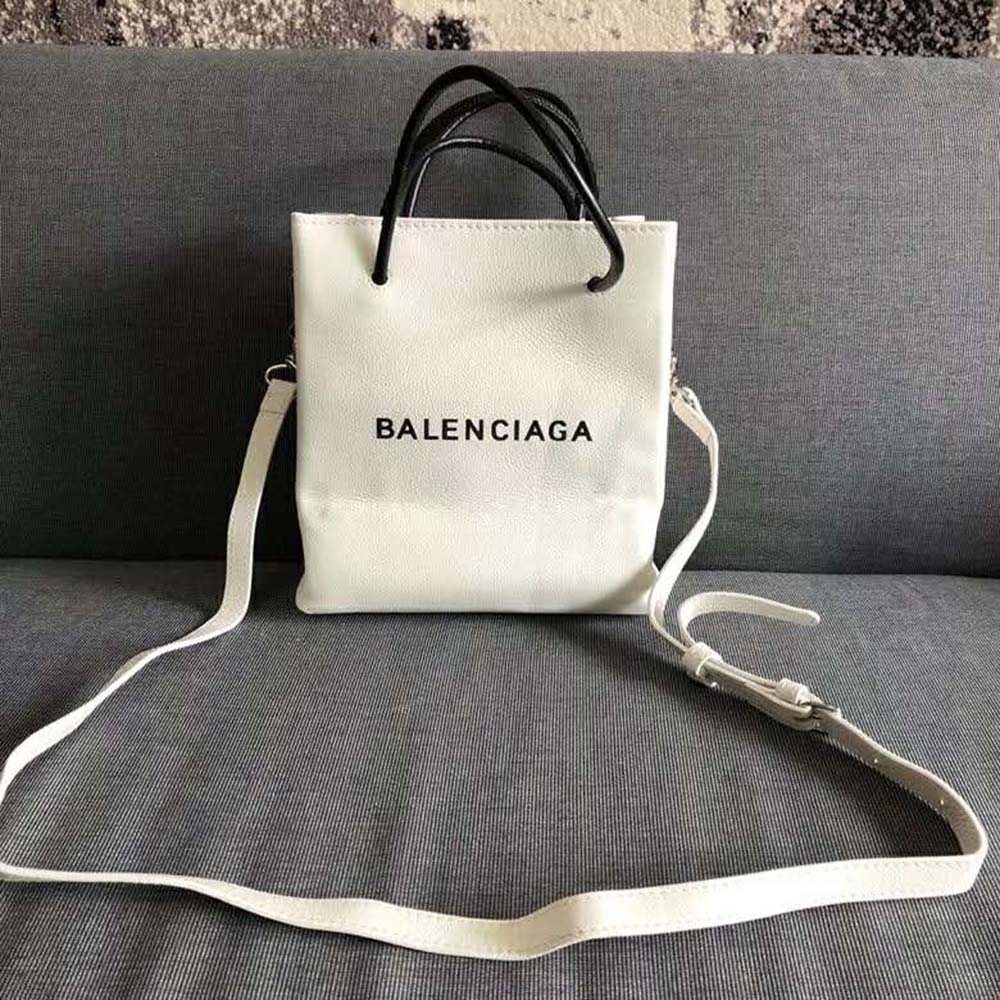 Close-up of signature engraved hardware on Balenciaga Women Shopping Tote XXS Bag