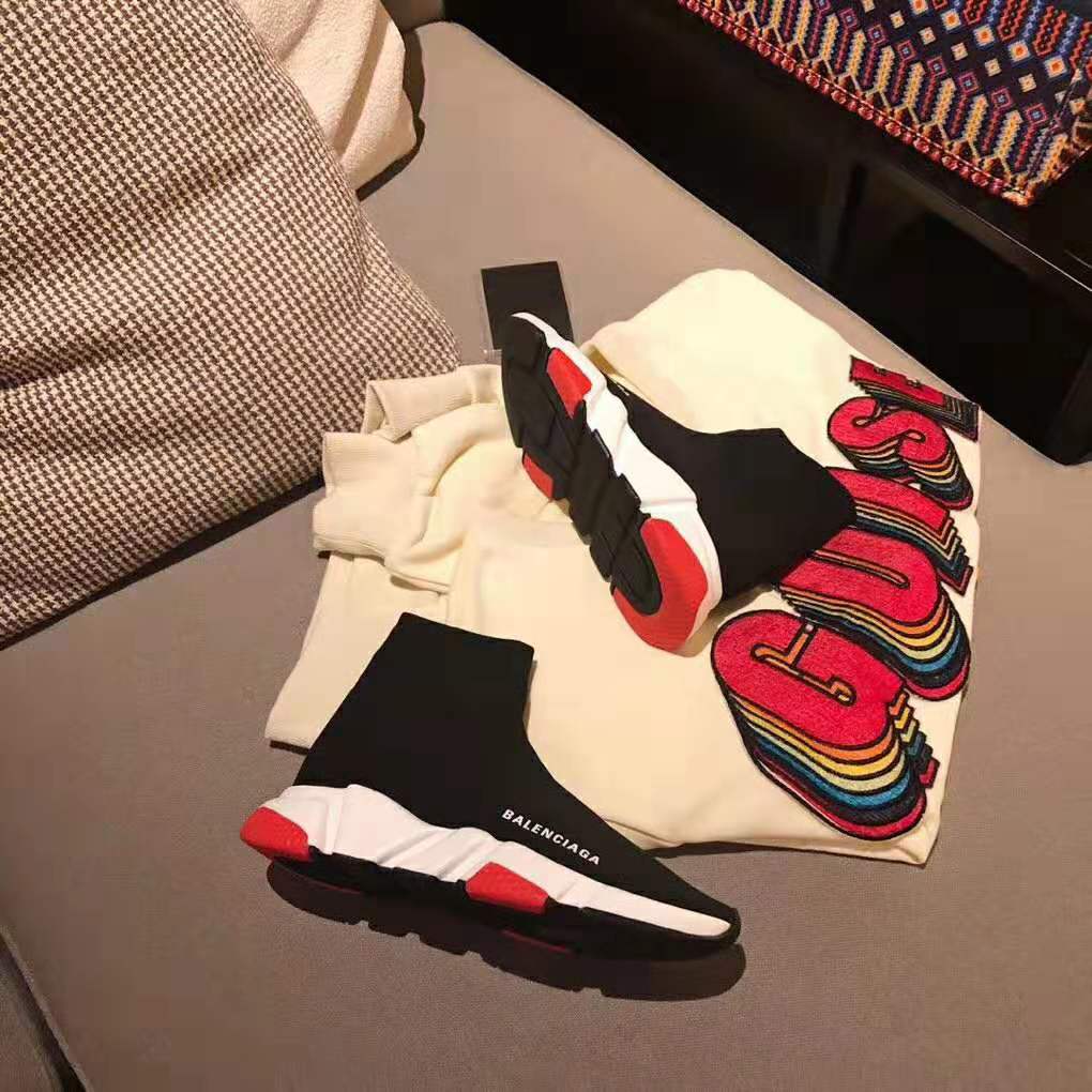 Close-up of black knit upper and white Balenciaga logo detailing