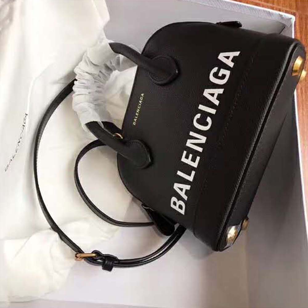 Side angle showing structure and top handle of Balenciaga Women Ville XXS bag