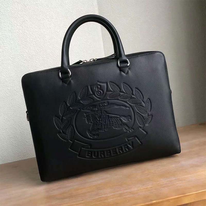 Side angle highlighting slim silhouette of Burberry Men Embossed Crest Leather Briefcase-Black